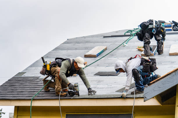 Professional Roofing technician working in Riverside, NY